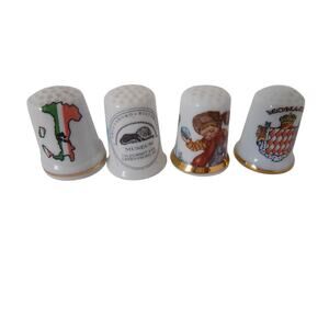 Lot of 4 porcelain thimbles Italy Finsbury Monaco